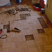 Parquet flooring with pet stained wood removed